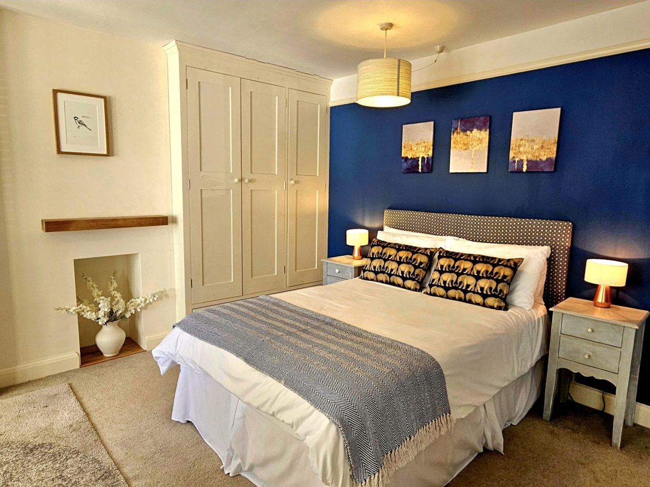 A beautifully calm, generously sized bedroom designed for deep sleep, slow mornings and total switch-off.