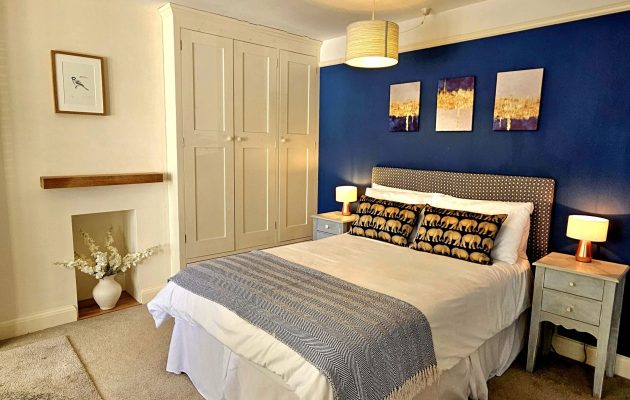 A beautifully calm, generously sized bedroom designed for deep sleep, slow mornings and total switch-off.