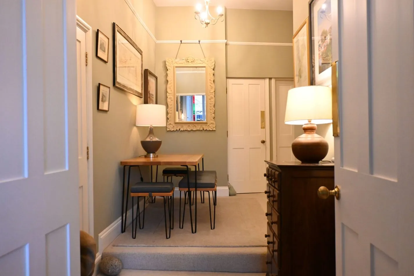 Your spacious hallway creates a bright, welcoming first impression, with elegant double doors drawing you through to your light-filled lounge—setting the tone for a stylish stay in central Sandwich, Kent.