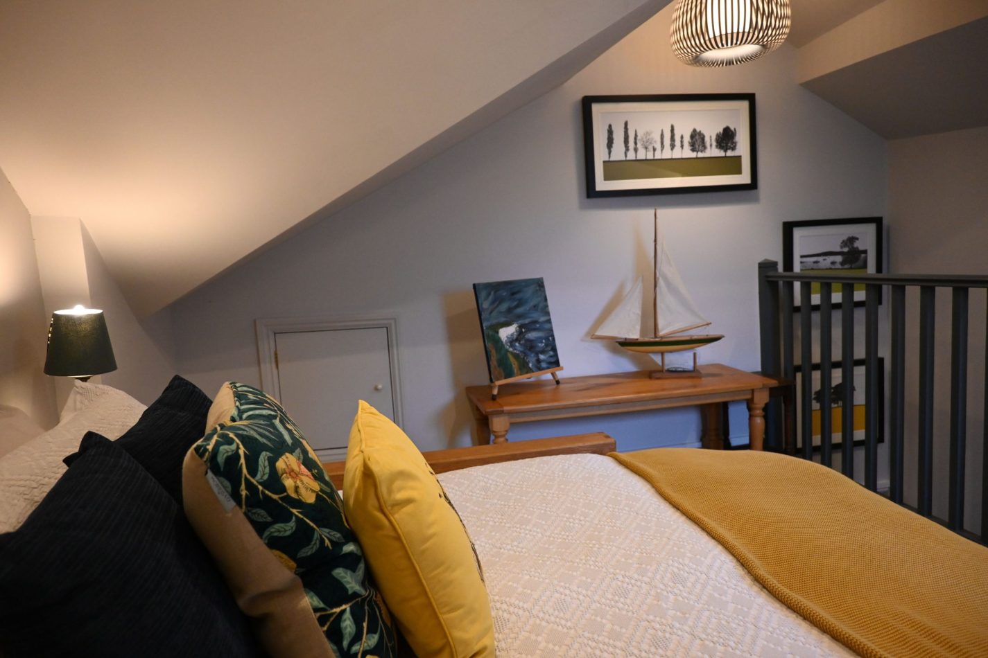 Your cosy upstairs bedroom is tucked into the eaves, creating a warm, characterful hideaway in your central Sandwich apartment—perfect for restful nights after days exploring the coast, golf courses and historic streets.