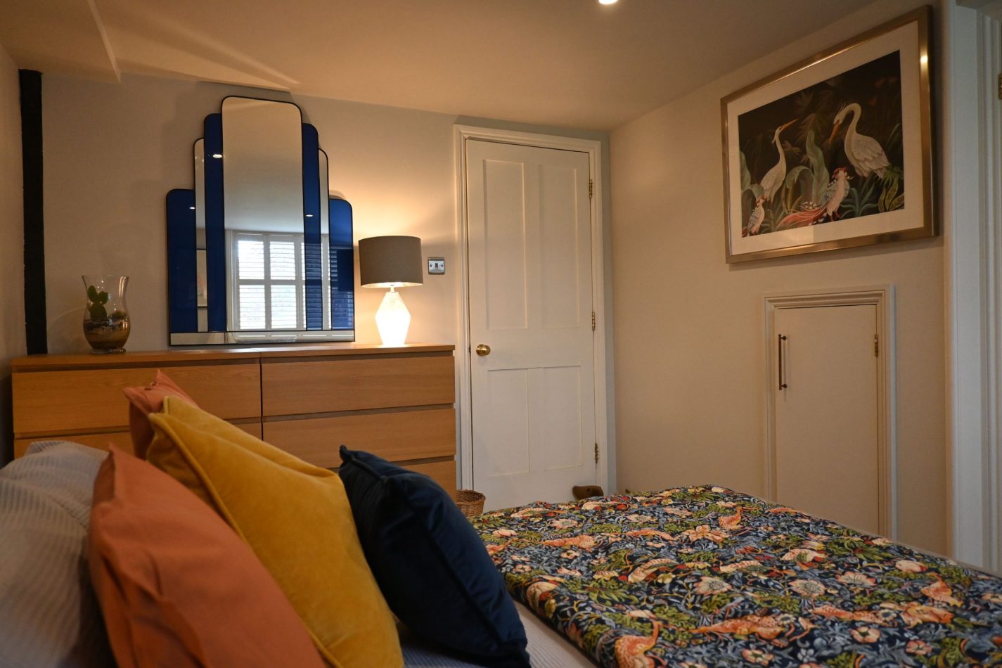 Your main bedroom offers a calm, beautifully styled retreat, with views across gardens and the historic Sandwich church—perfect for slow mornings and restful nights in your central Kent apartment.