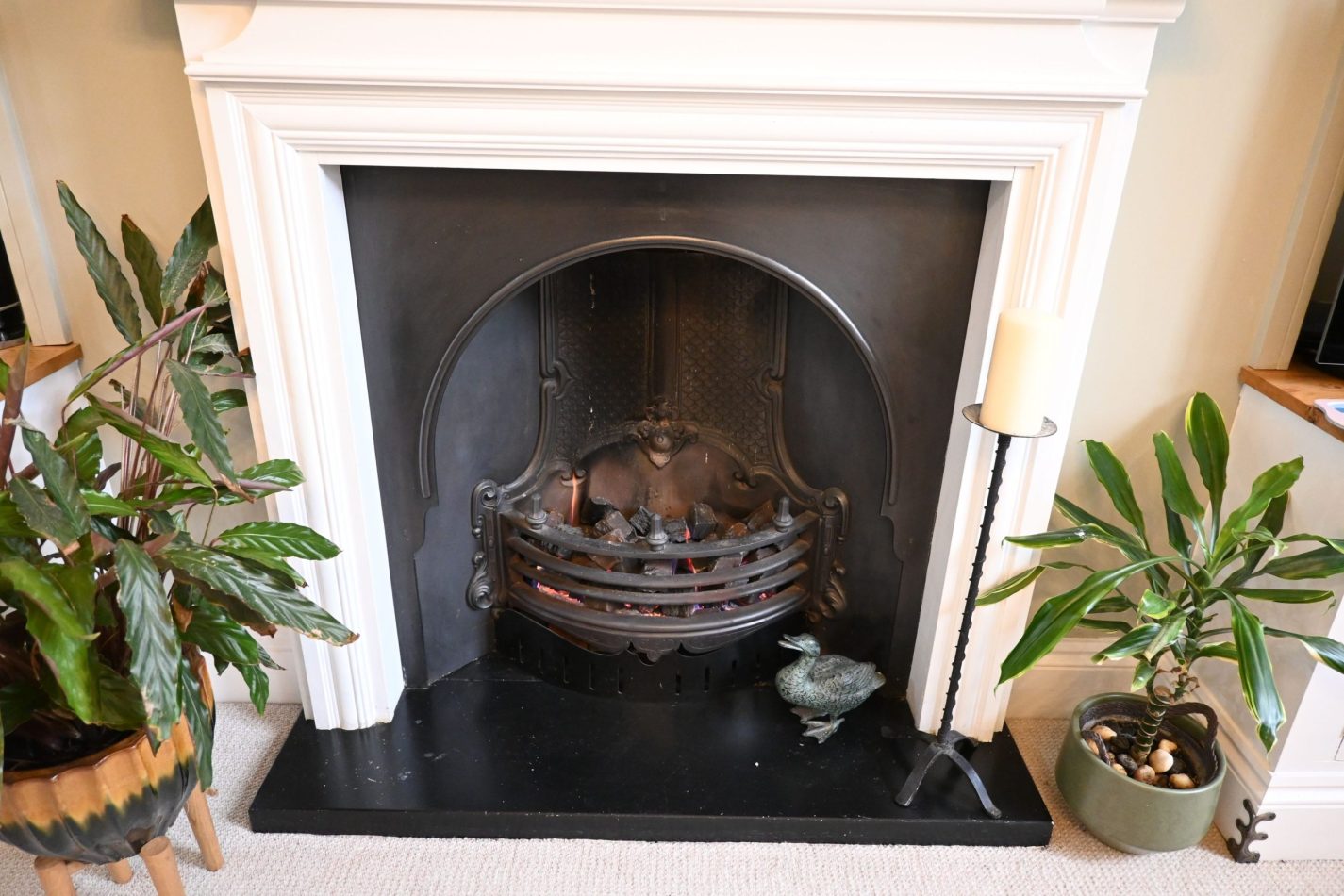 Your lounge is centred around an elegant statement fireplace—an eye-catching focal point that adds character and charm (feature only, not in use) to your stylish central Sandwich apartment.