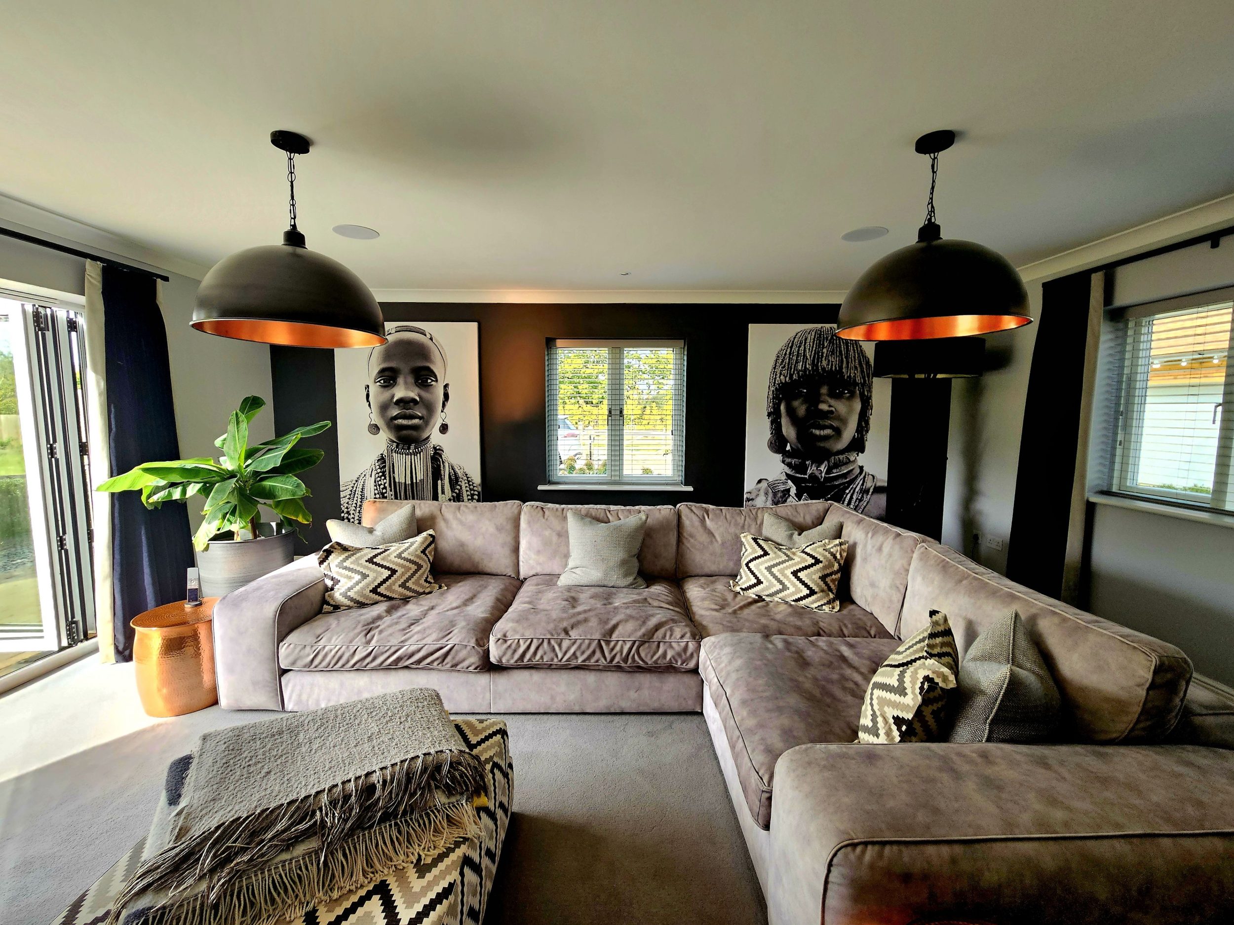 Step into a cosy African-inspired cinema room, rich with warm textures and earthy tones. Sink into plush seating and enjoy movie nights in this unique snug space â€” perfect for relaxing evenings in a luxury holiday home in Kent.