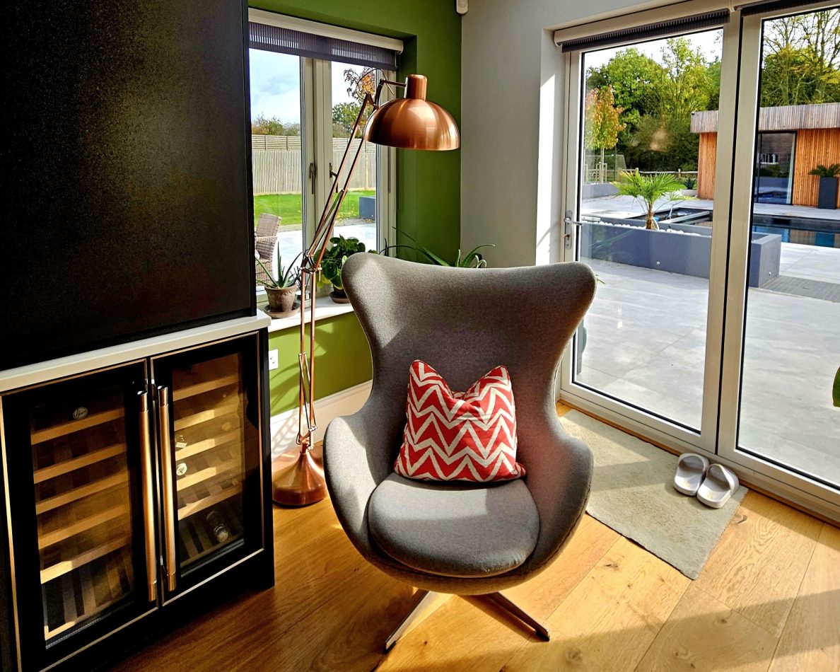 Enjoy a dedicated wine fridge and cosy corner to relax, perfect for unwinding with a glass in hand. A stylish touch that adds comfort and luxury to your stay in this Kent holiday home.