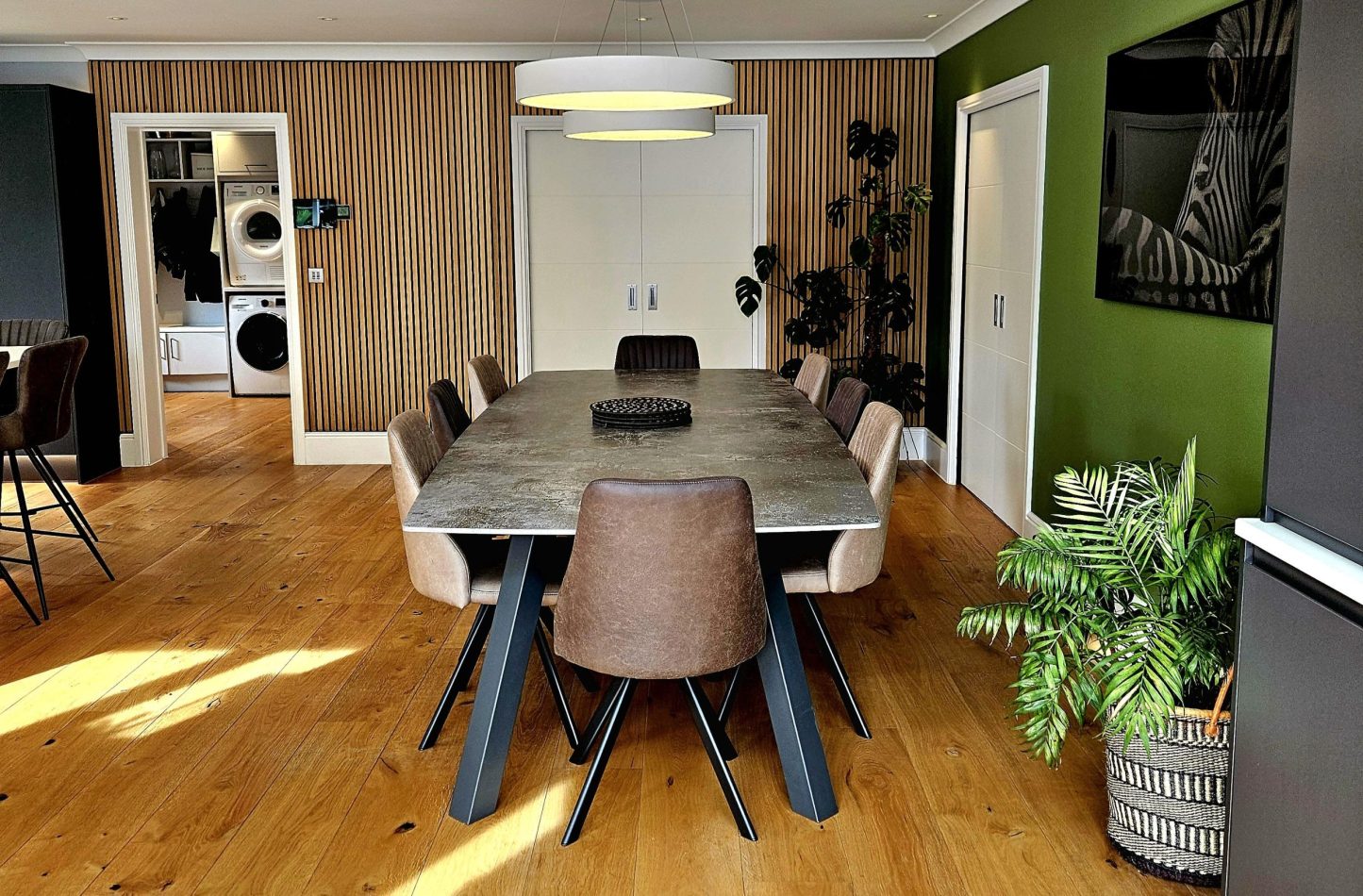 Gather around the large dining table for 12 set within a spacious kitchen, perfect for sociable meals and group stays. A welcoming hub for cooking, dining and making memories in this luxury Kent holiday home.