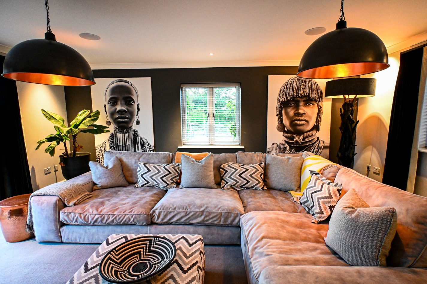 Step into a cosy African-inspired cinema room, rich with warm textures and earthy tones. Sink into plush seating and enjoy movie nights in this unique snug space  perfect for relaxing evenings in a luxury holiday home in Kent.
