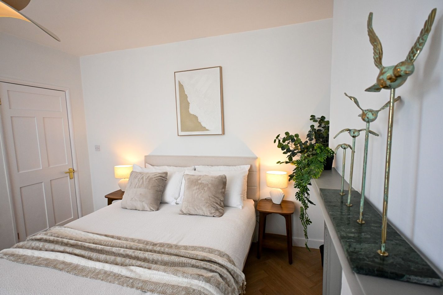 Blending boutique hotel style with coastal comfort, this beautifully appointed king bedroom offers a peaceful retreat after a day by the sea. Soft textures, calming tones and thoughtful details create the perfect space to relax, recharge and enjoy your Ra