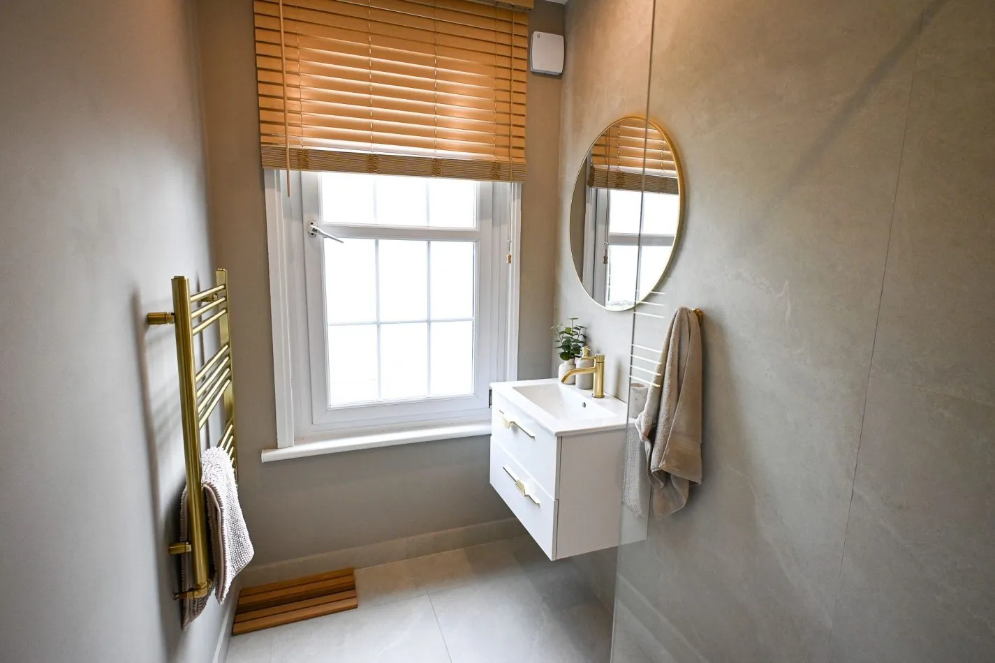Conveniently located on the top floor, this bright and contemporary shower room features elegant finishes and luxury touches throughout. Perfect for larger groups, it provides additional space to refresh and recharge during your stay at Kent House.