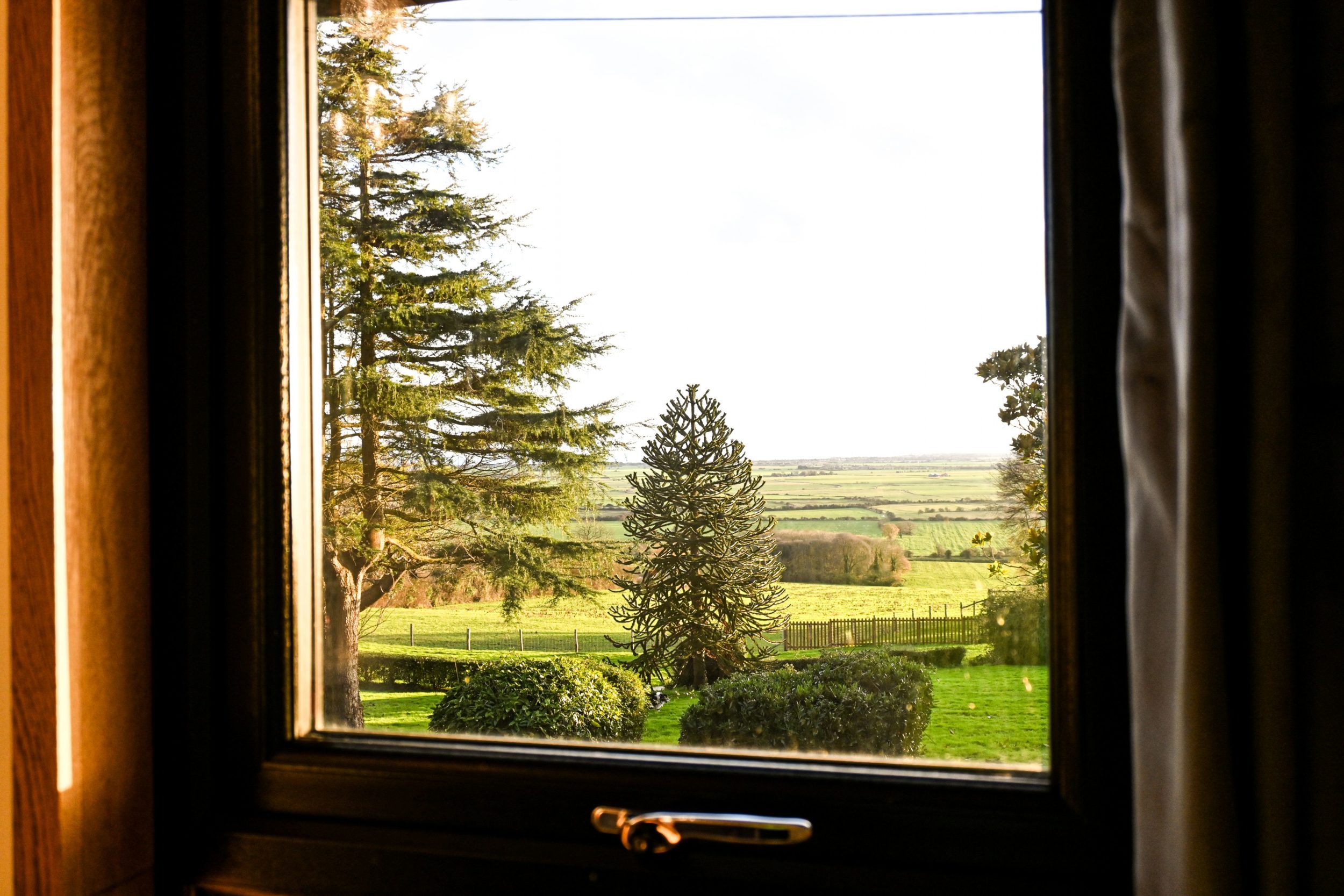 Wake to far-reaching countryside views from your cabin window, watching the morning light spread across rolling fields towards the distant Kent coast.