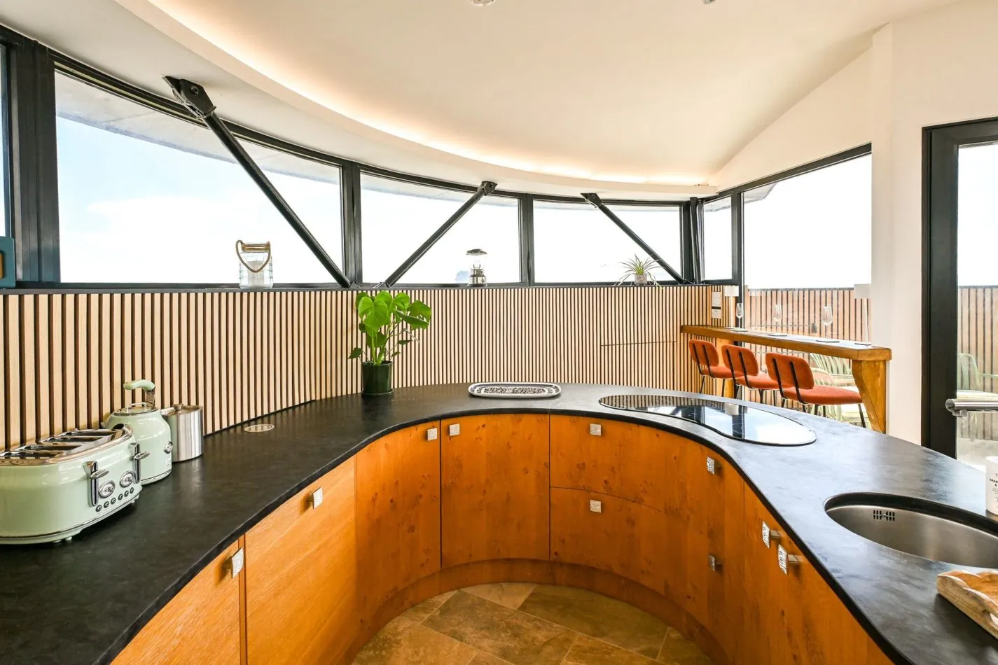 A kitchen unlike any other! Designed around the original curves of the Martello Tower, this beautifully fitted space combines centuries of history with everything you need for a fabulous group getaway.