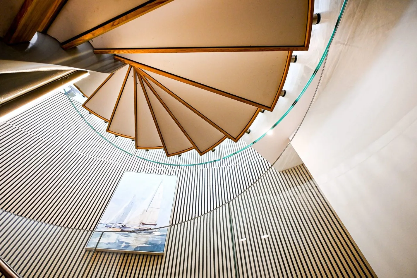 Even moving between floors feels like part of the adventure. The striking staircase winds its way through the tower, connecting centuries-old architecture with its beautifully transformed interiors.