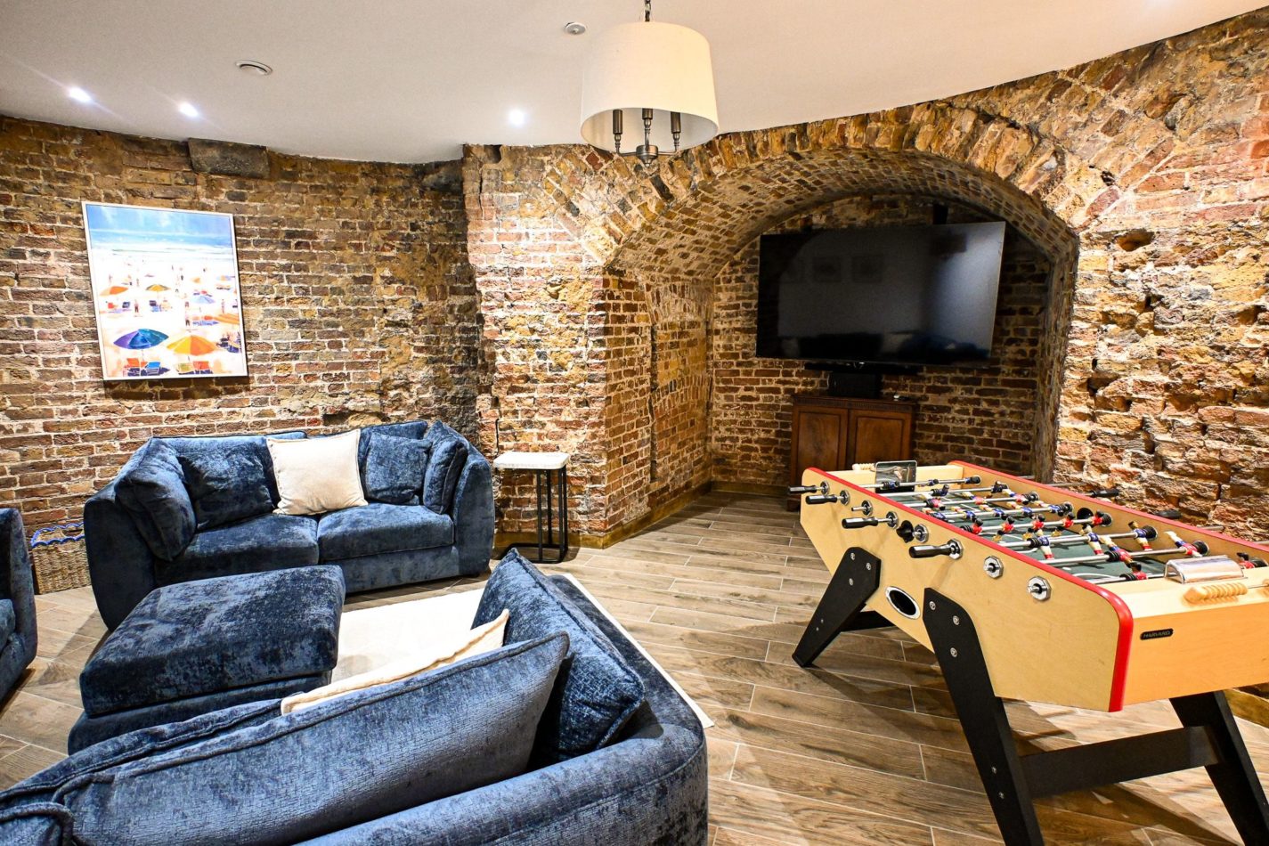 And this is where the competition begins! Challenge the family to table football, put a film on afterwards and make this cosy lower-ground snug the headquarters for rainy days and late-night laughs.