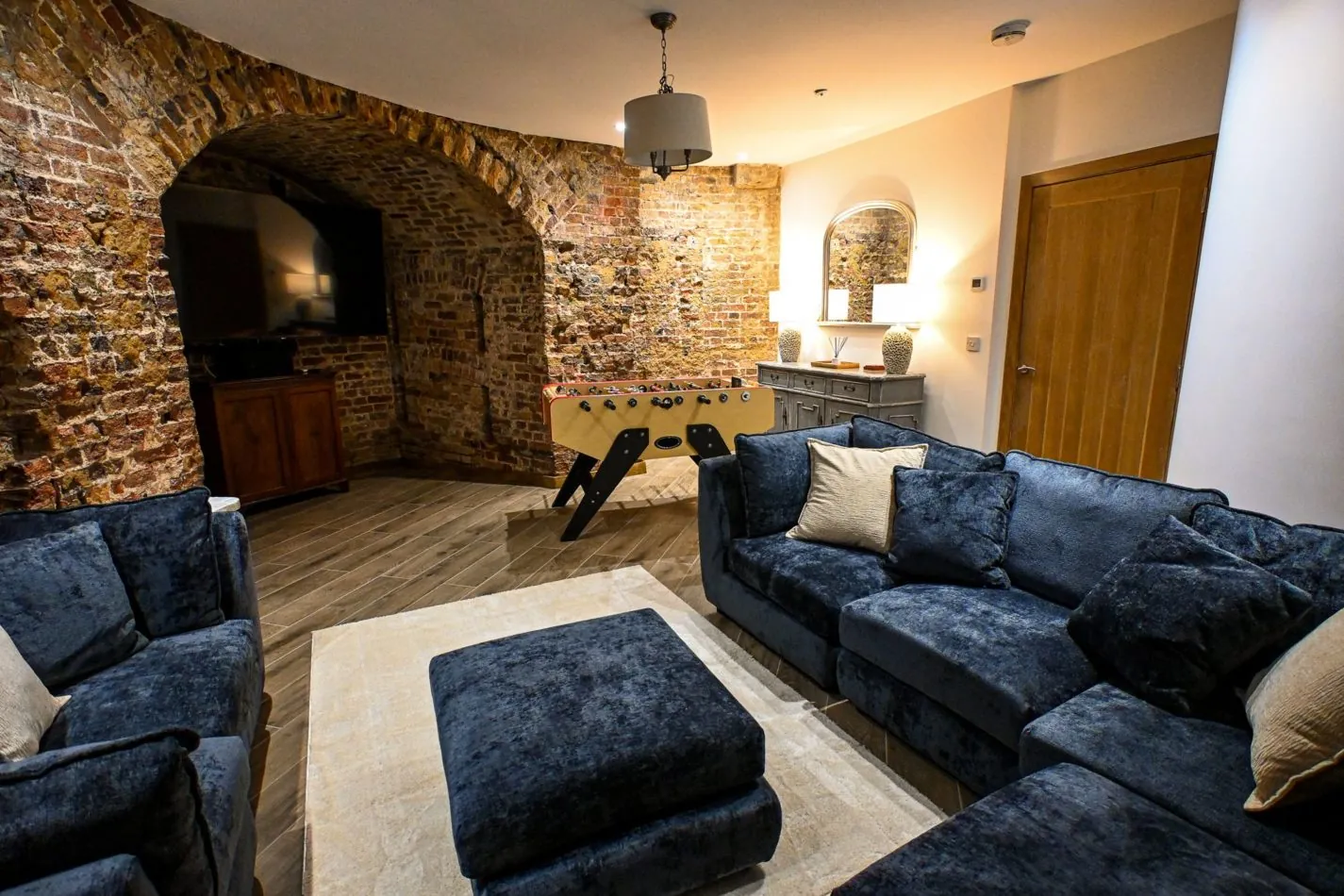Your cosy hideaway inside the tower. Sink into the sofas for a movie night, let the children claim their own space, or escape here with a good book when you fancy a quieter moment.