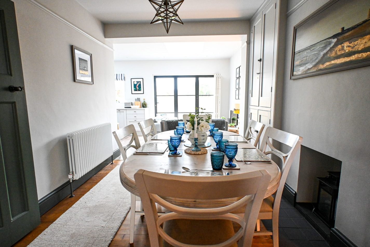 Gather around the dining table for leisurely breakfasts, family dinners and evenings spent catching up, with natural light streaming through from the garden beyond.
