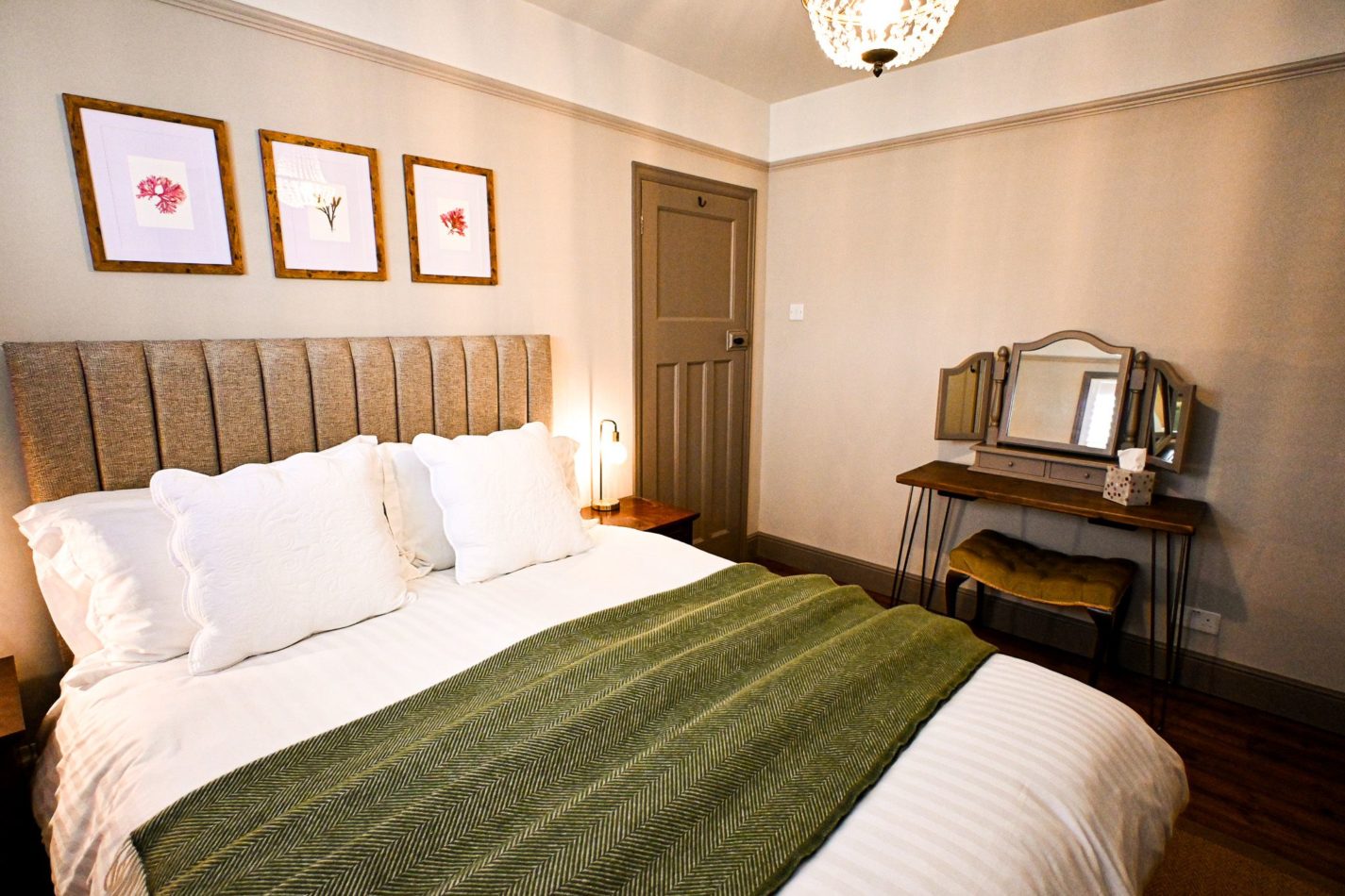 Retreat to the beautifully styled king bedroom, with soft bedding, calming colours and thoughtful finishing touches to help you enjoy a restful night by the sea.