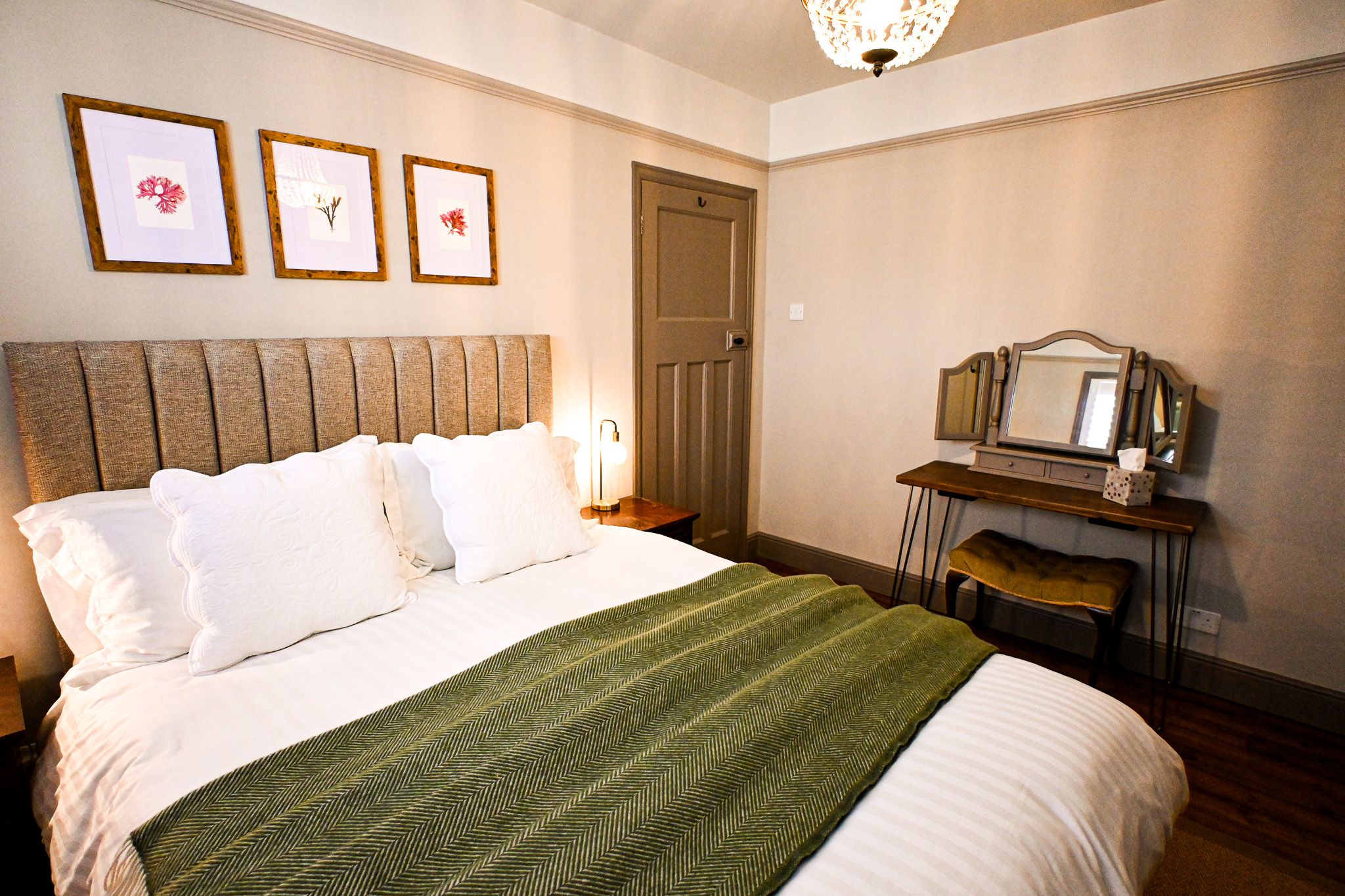 Retreat to the beautifully styled king bedroom, with soft bedding, calming colours and thoughtful finishing touches to help you enjoy a restful night by the sea.