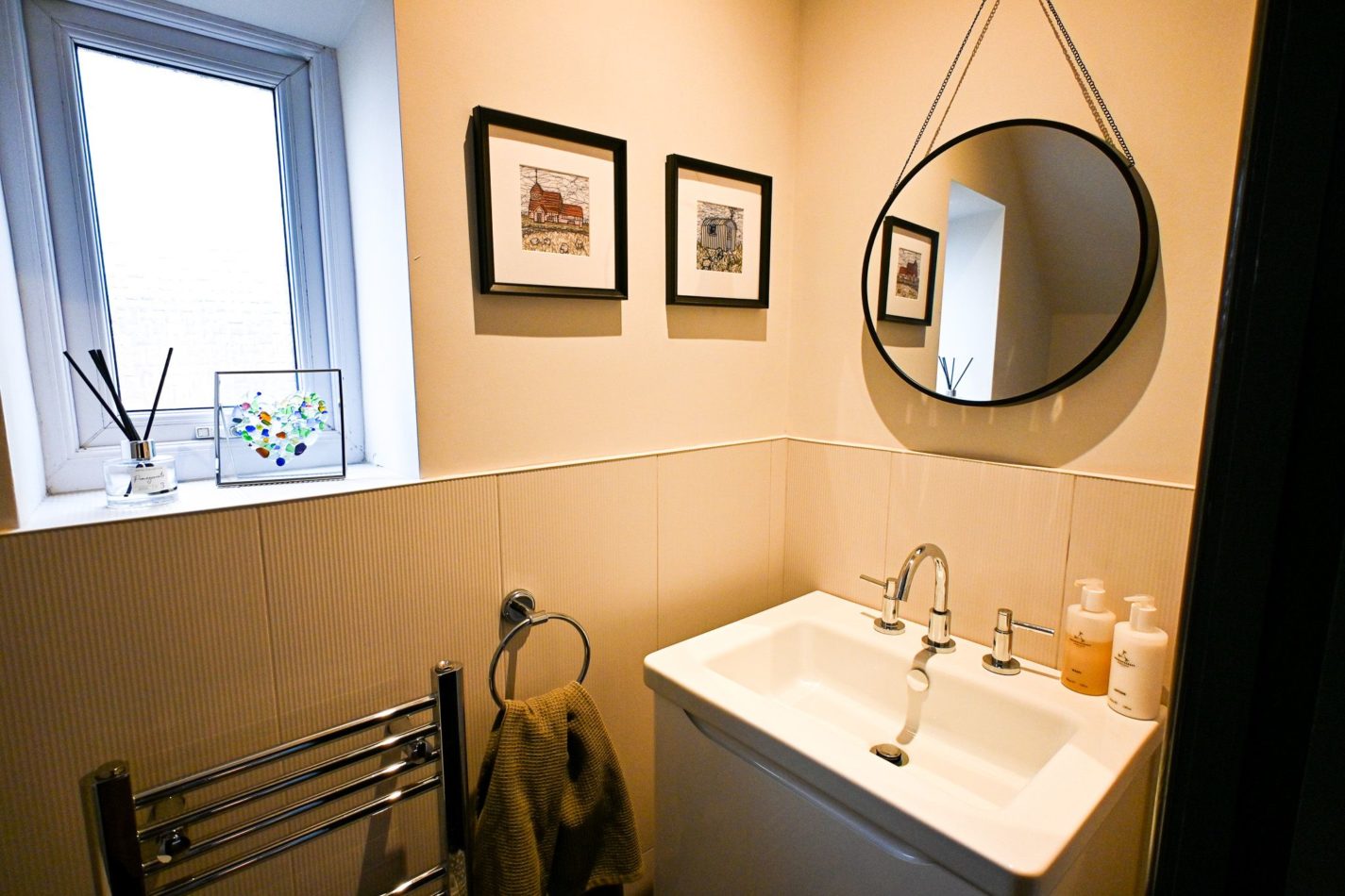 The stylish downstairs toilet adds extra convenience for families and groups, particularly when everyone is getting ready for a day out exploring Hythe.